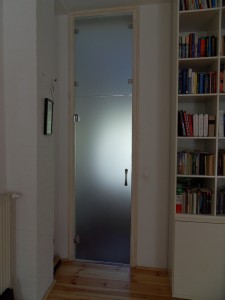Beltéri ajtó savmart üvegből, felülvilágítóval